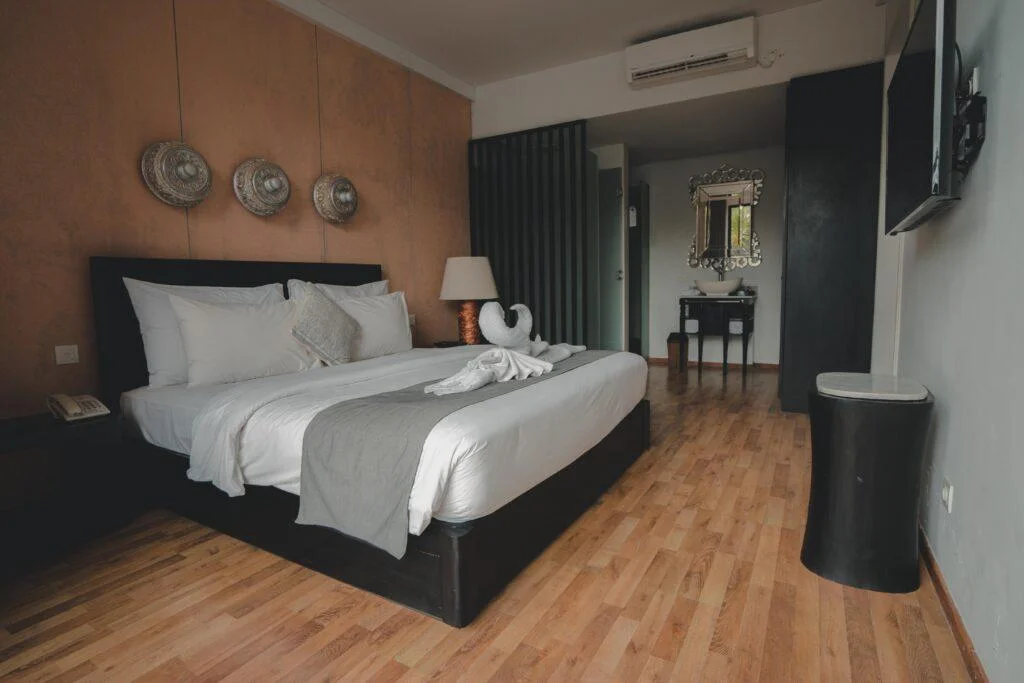 Luxurious room in our villa with a comfortable queen size bed and elegant decor.