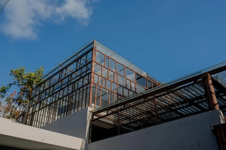 Luxurious property in Bali with stunning front view of clear blue sky.